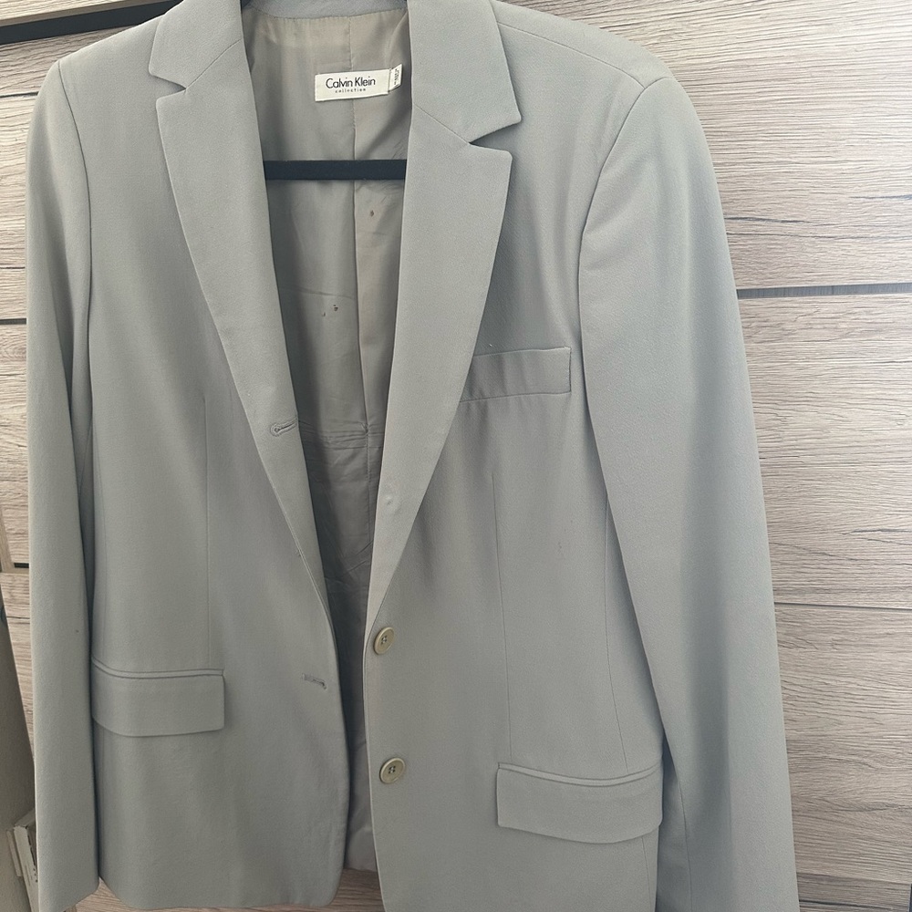 Vintage Calvin Klein women’s baby blue jacket made in Italy.